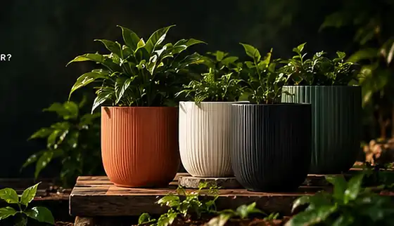 Ribbed plastic pots in terracotta, cream and black with green plants